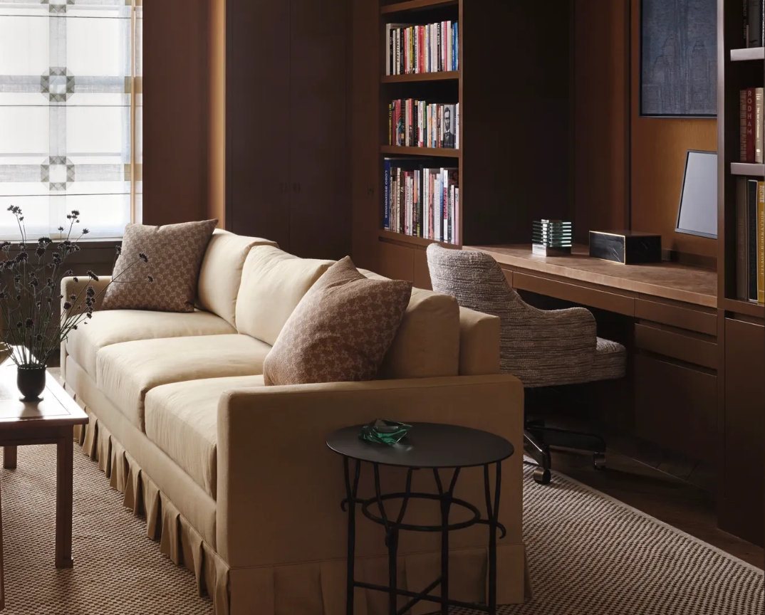 Study with a built-in desk and shelving