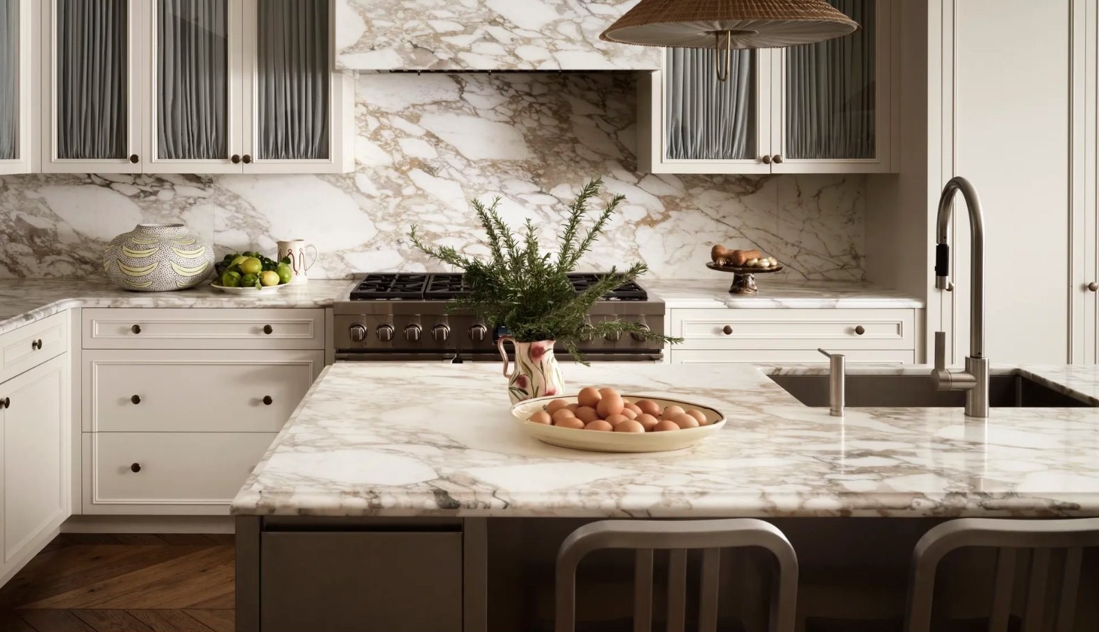 Kitchen with stone counters and painted cabinetry