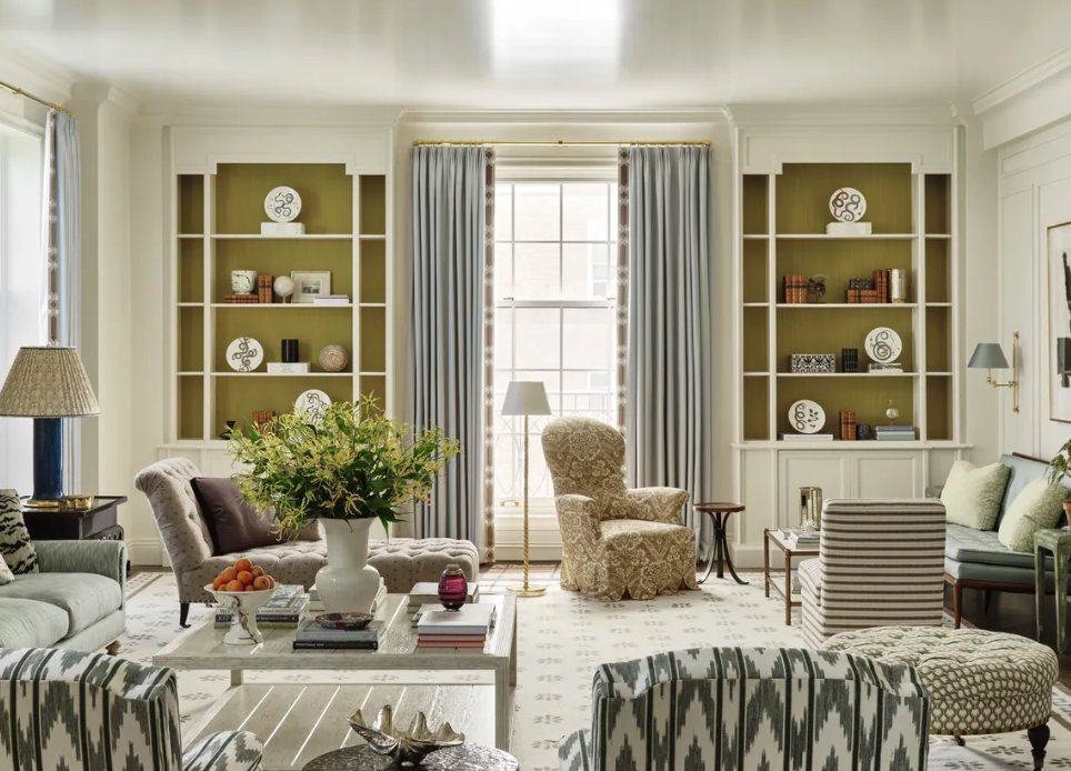 Living room with bookcase niches