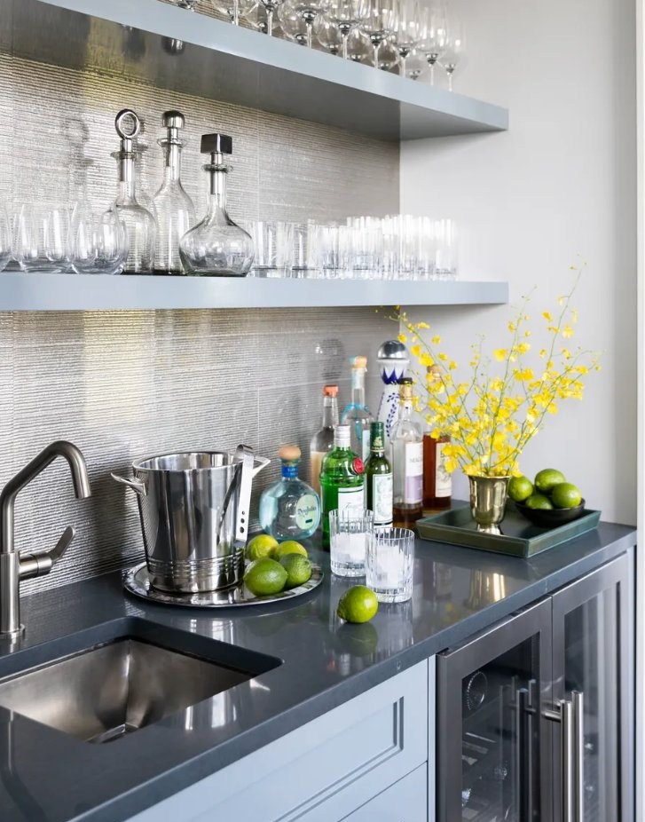Bar with glass display shelving